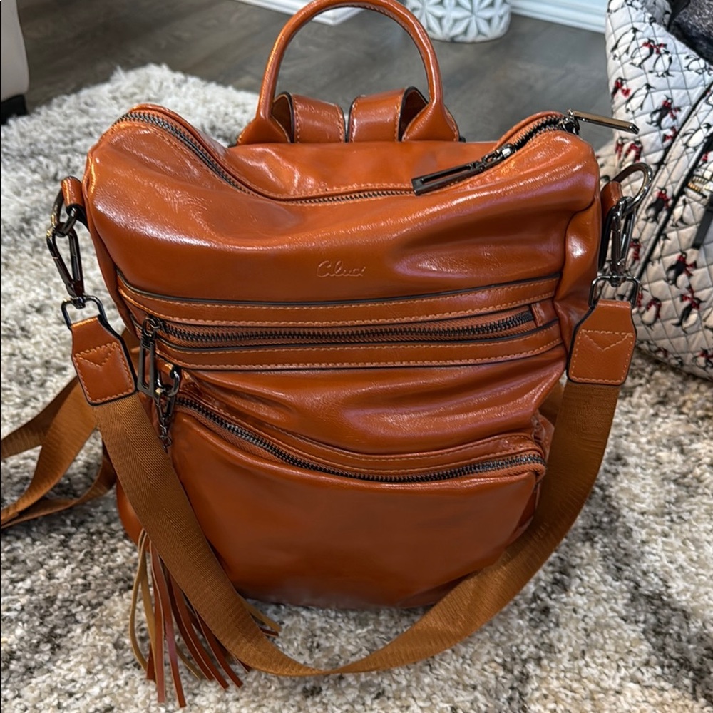 Tan Leather Convertible Backpack with Tassel Detail